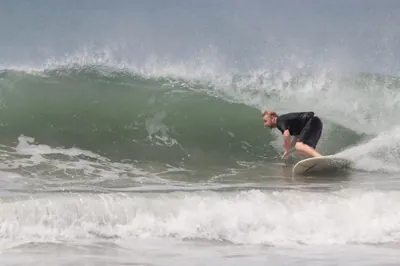 Daniel Grab surfing a wave off the Southern California coast