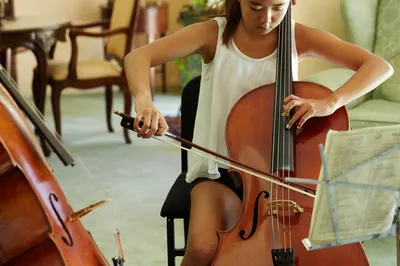 Student practicing at a music stand